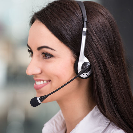 A woman with a headset on.