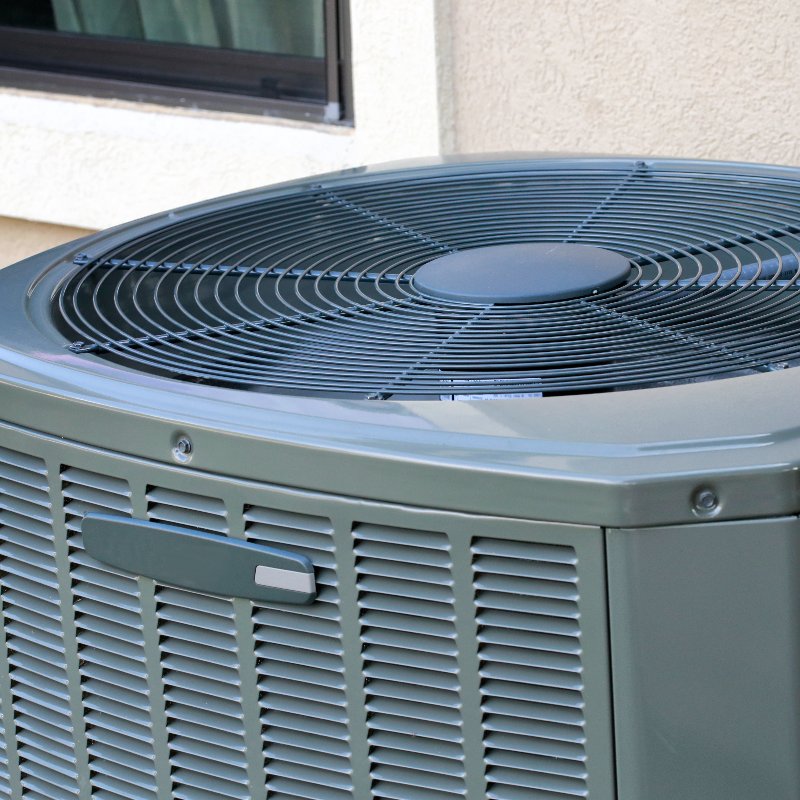 close-up of a modern AC unit sitting outside